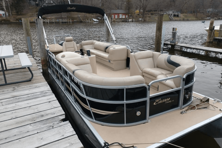 a boat sitting on top of a wooden chair