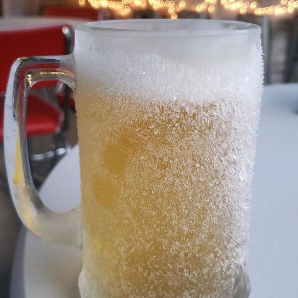 a glass mug on a table
