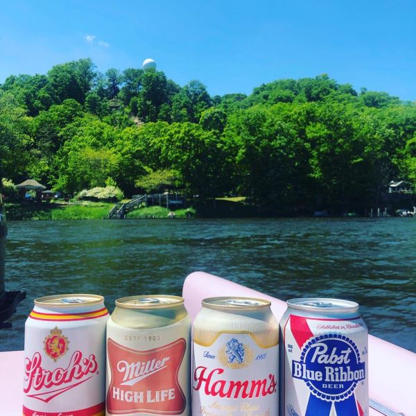 a can next to a body of water