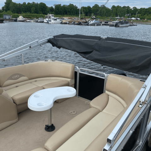 a boat parked next to a body of water