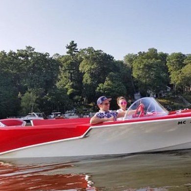 a small boat in a body of water