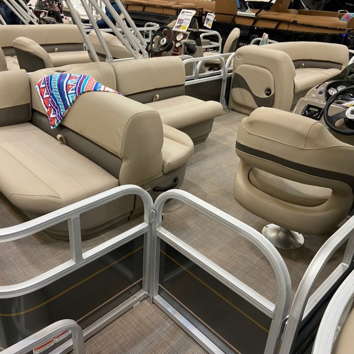 a row of parked motorcycles sitting on top of a car