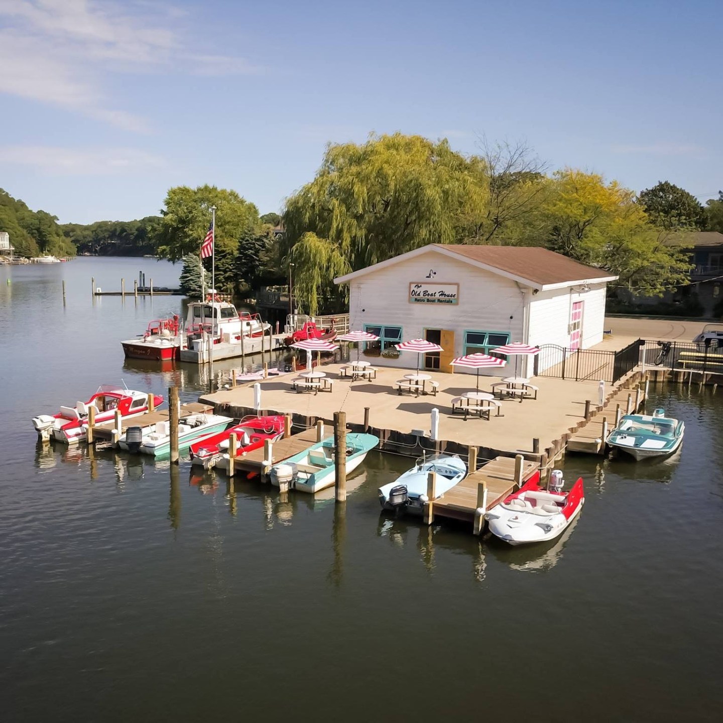 a boat is docked next to a body of water