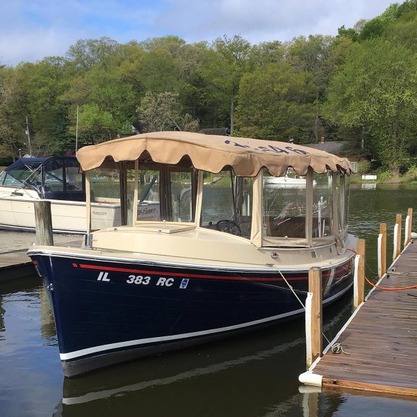 a boat is docked next to a body of water