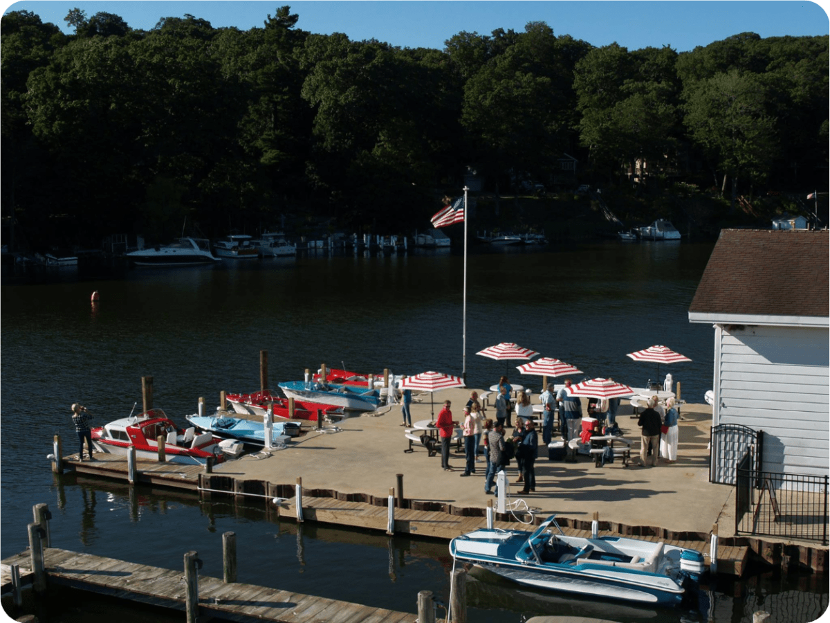 a boat is docked next to a body of water