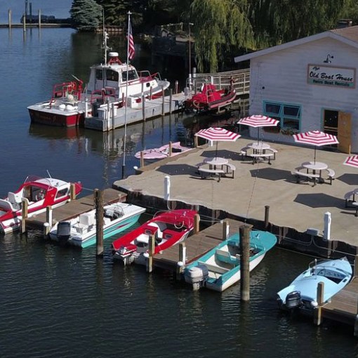 a boat is docked next to a body of water