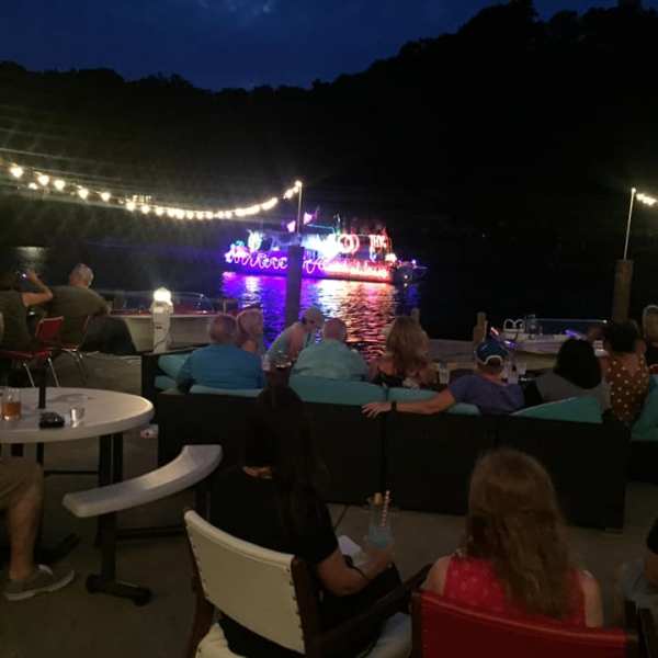 a group of people sitting at night