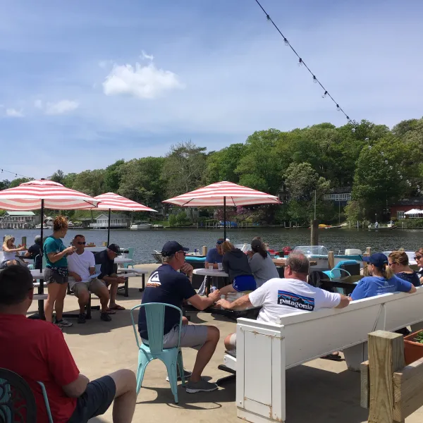 a group of people sitting at a park