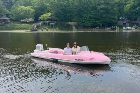 a small boat in a body of water